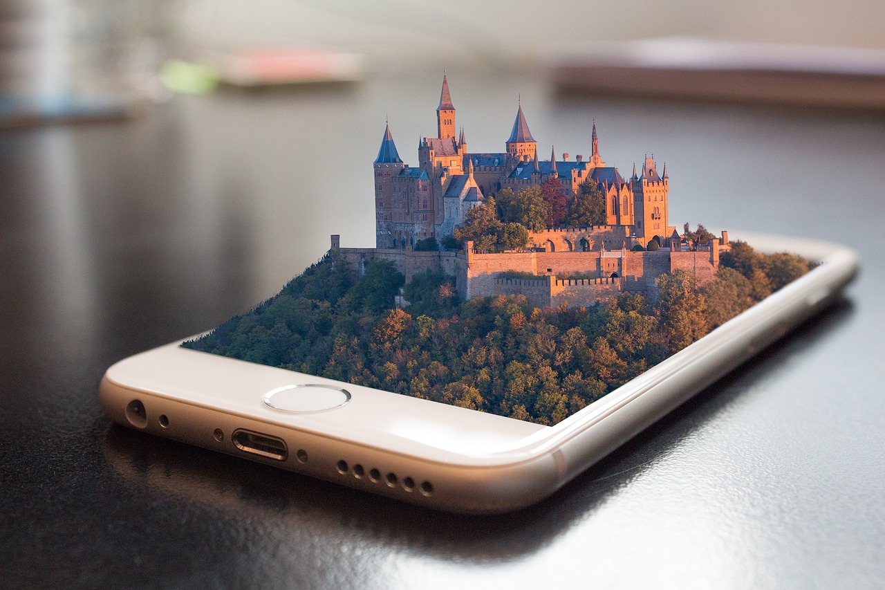 Image of smart phone with 3D castle popping out of it