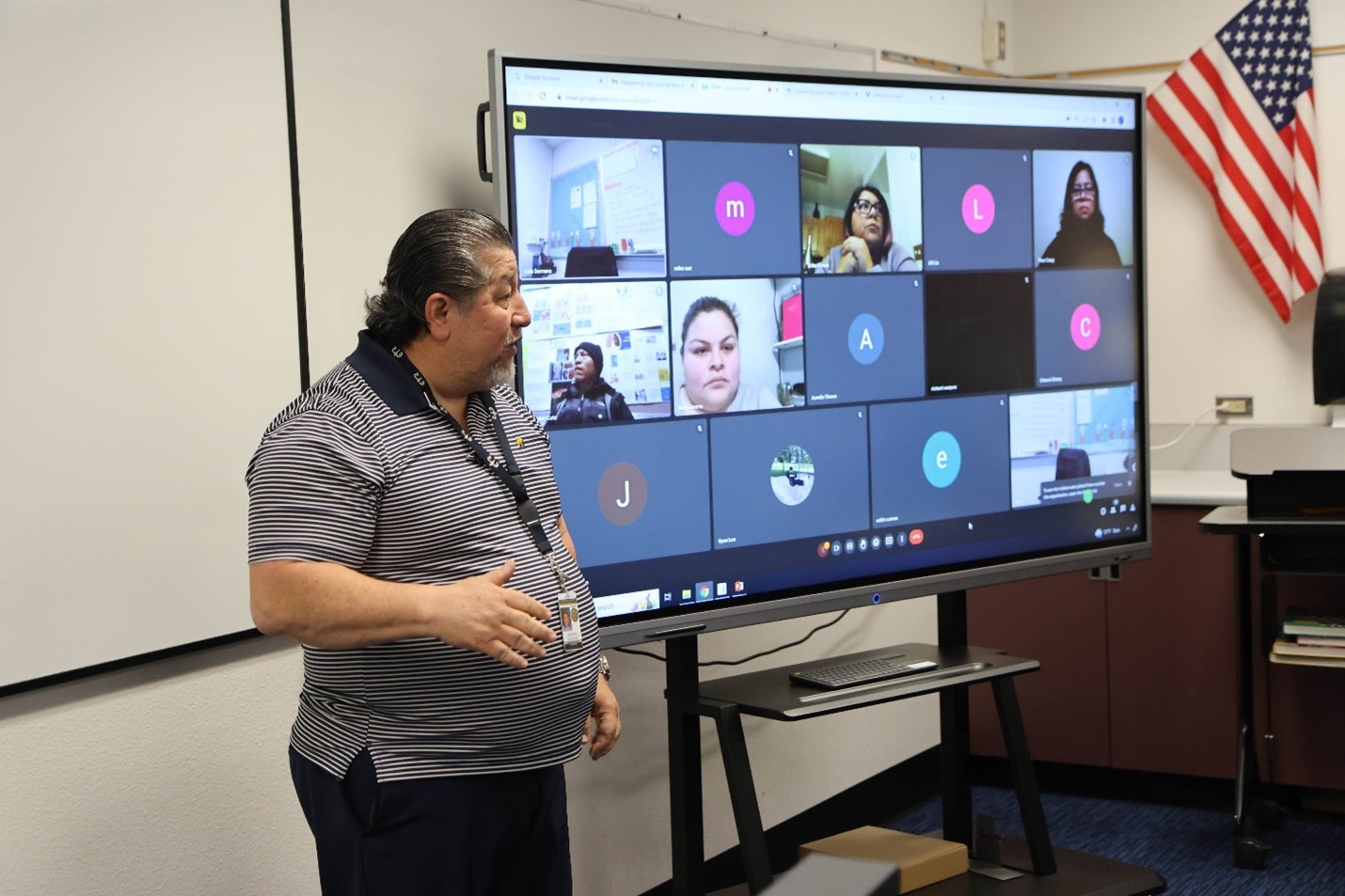 teacher addressing students on zoom