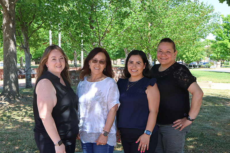 Members of the Clovis Adult School DLAC team with their coach
