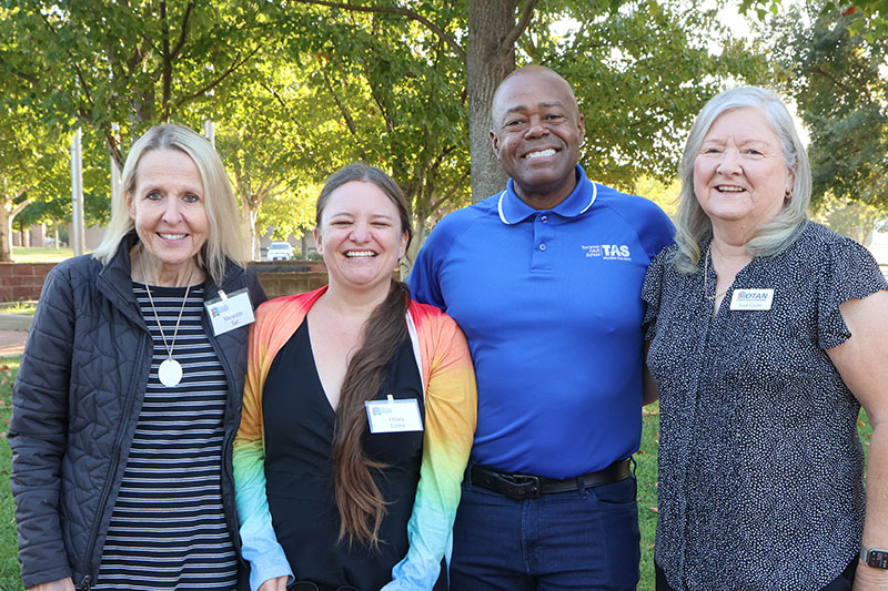 Members of the Torrance Adult School DLAC team with their coach