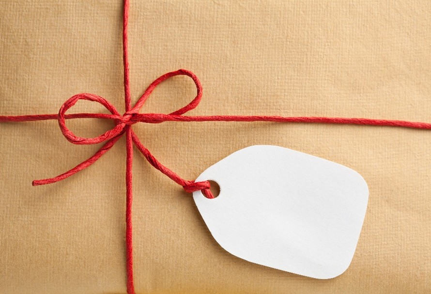 brown gift wrap with a red bow