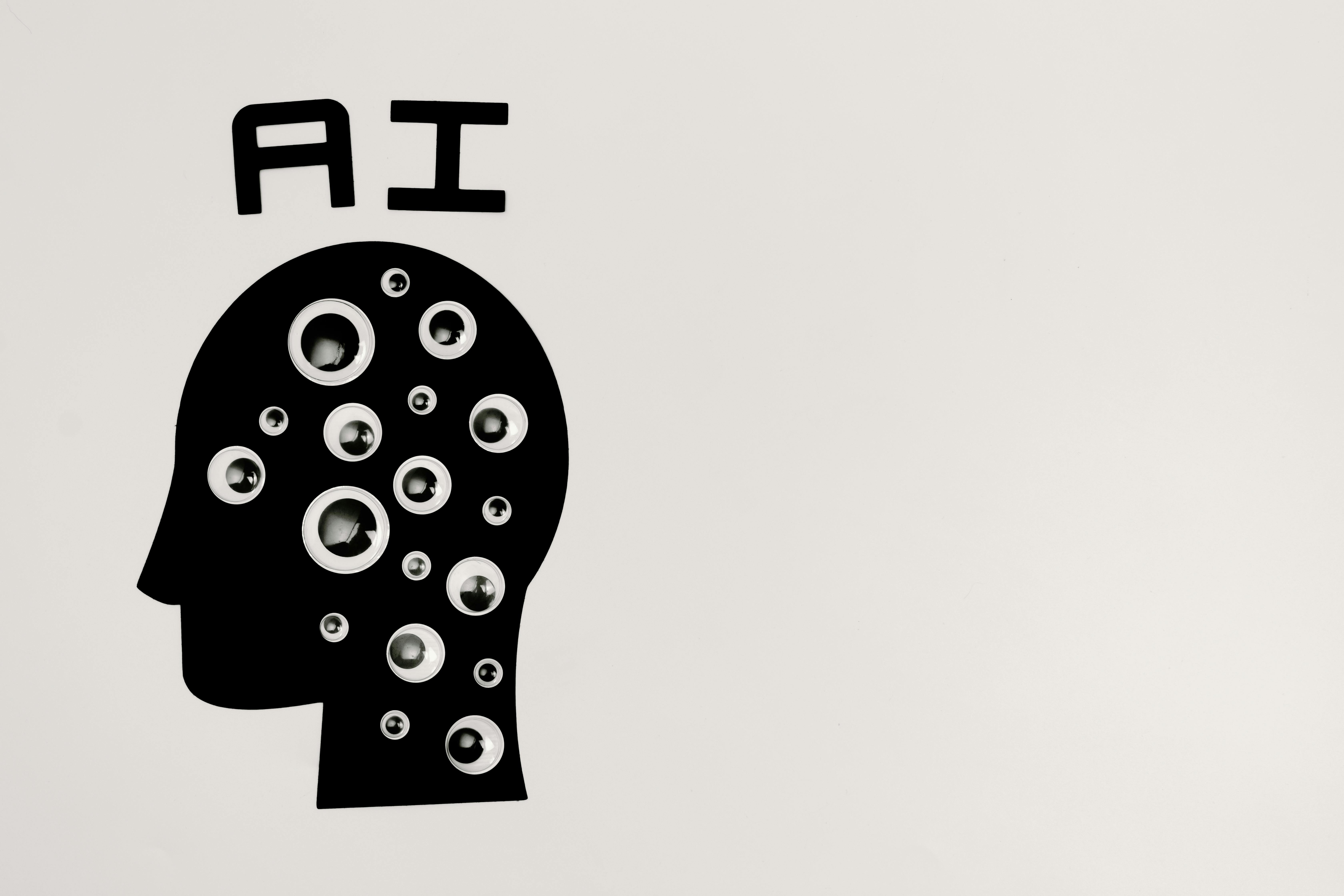 silhouette of a head with AI above it