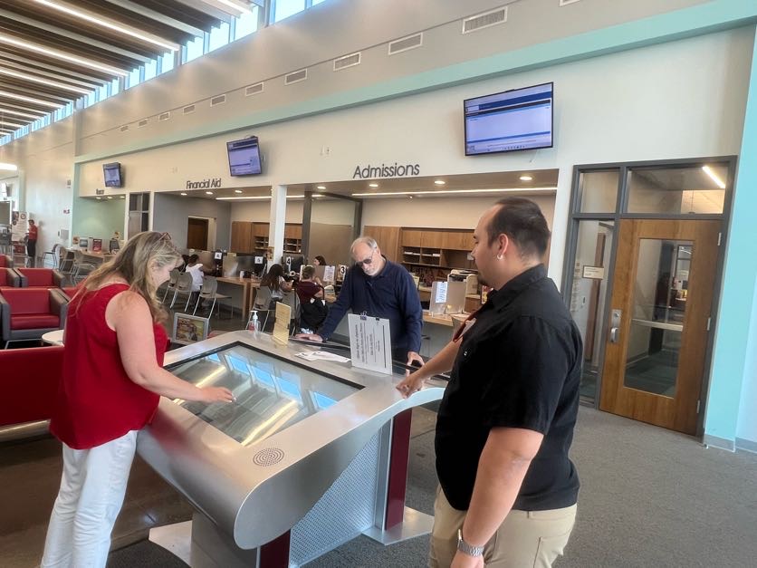 Apple Valley Team members testing out latest technology devices 