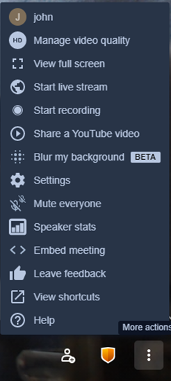 Image of Commands opened from three vertical dots including: Manage video quality, View full screen, Start live stream, Start recording, Share a YouTube video, Blur my background, Settings, Mute everyone, Speaker Stats, Embed meeting, Leave feedback, View shortcuts, and Help.