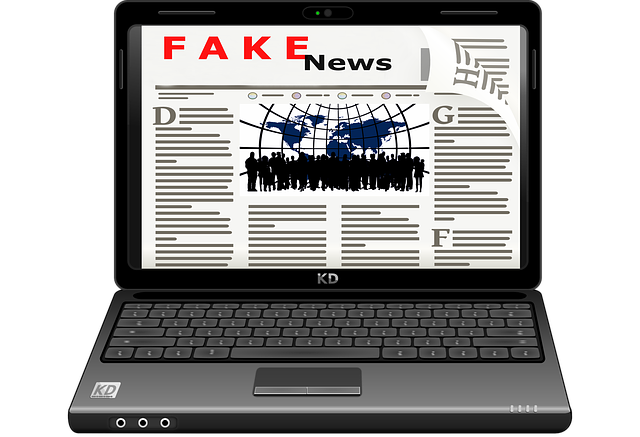 Laptop with screen displaying "Fake News"