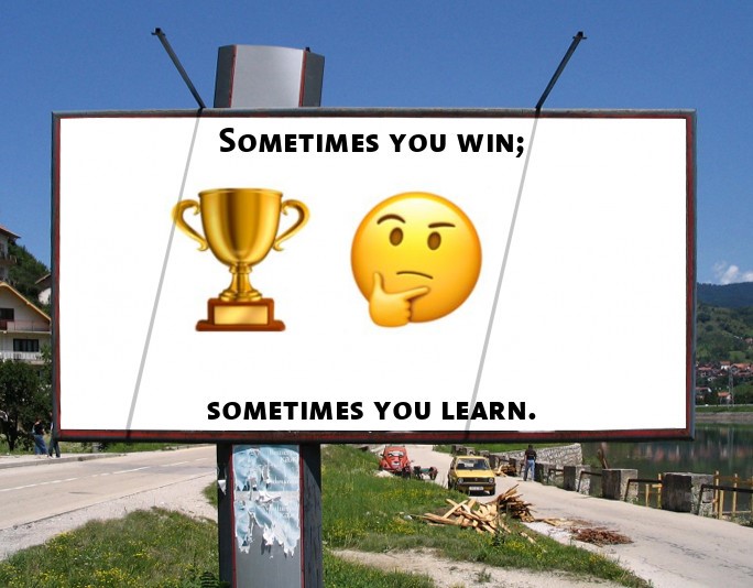 Billboard with trophy and wondering emoji face with the words: Sometimes you win; sometimes you learn.