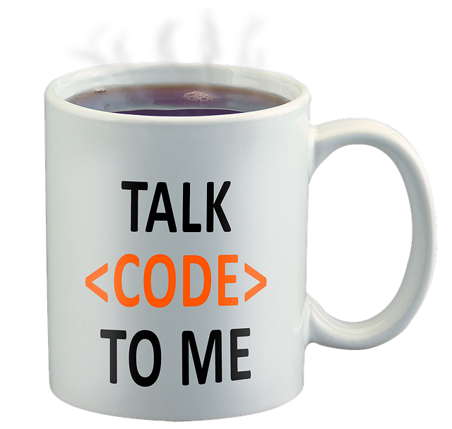 Coffee mug with the text "Talk <Code> To Me