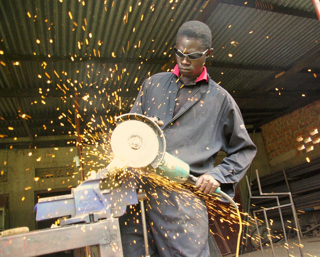 Man using angle grinder